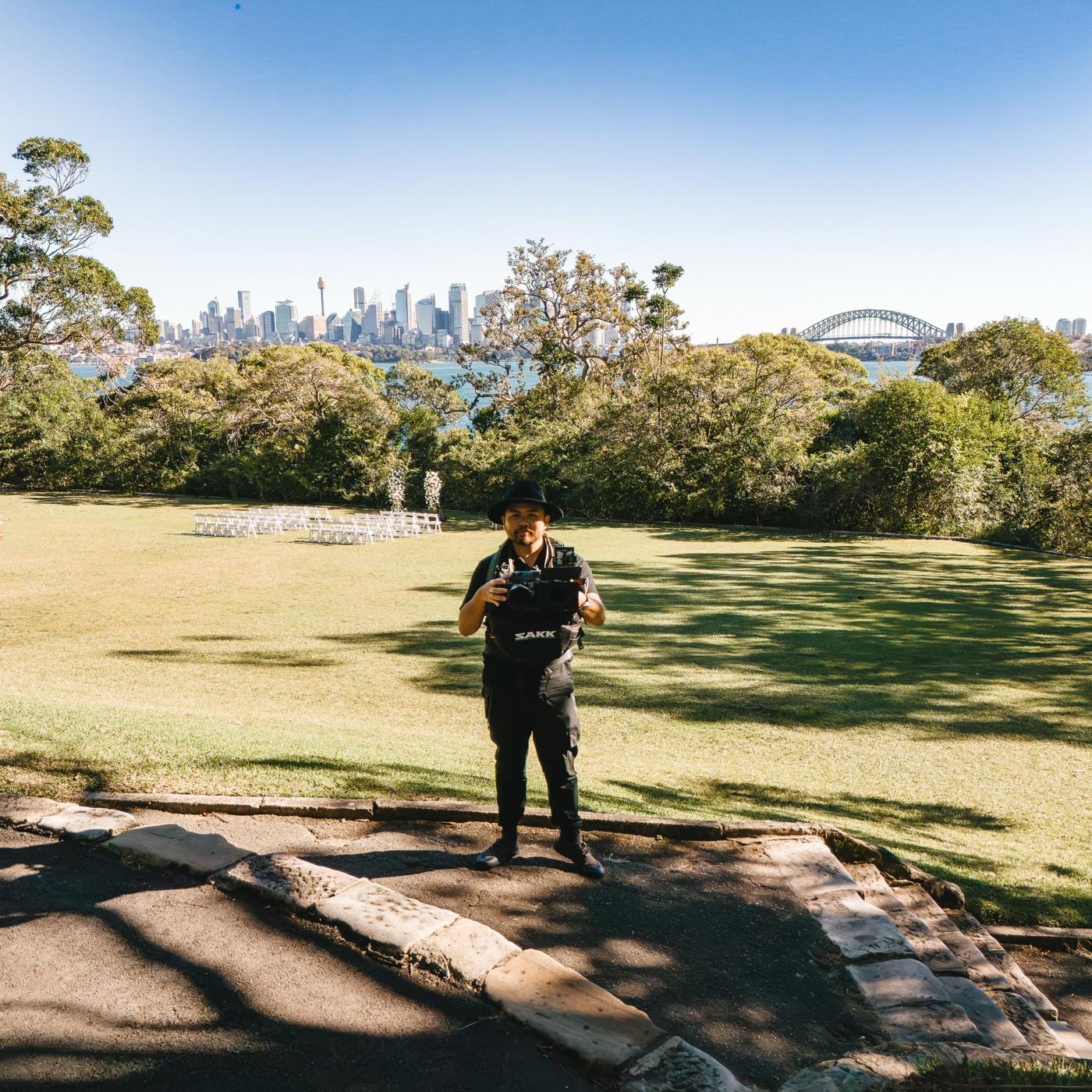 Amiel photographing a wedding